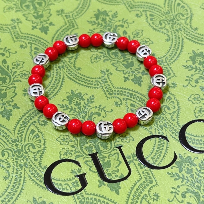 G*u*i bracelets